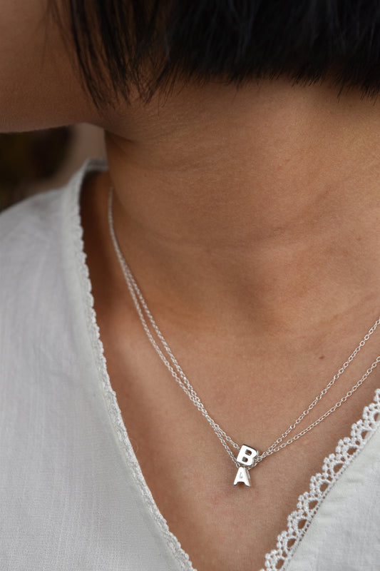 A initial necklace
