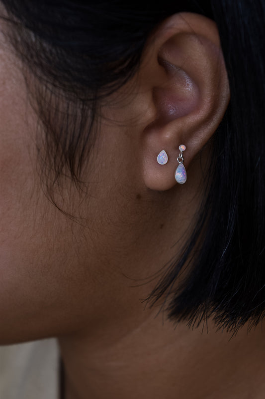 Lab grown opal earrings in tear drop shape. White opal colour earrings