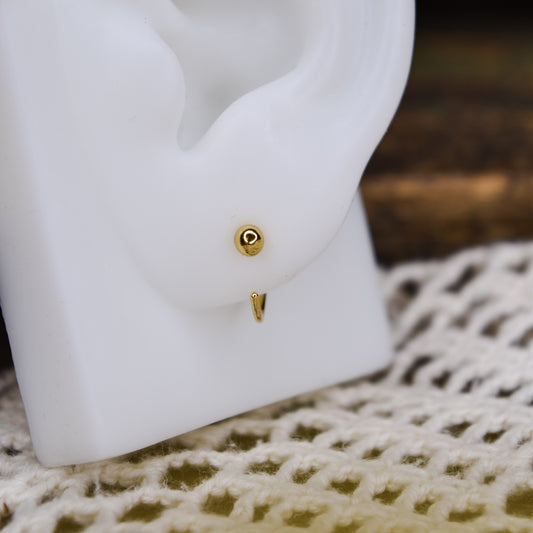 Gold ball ear huggers