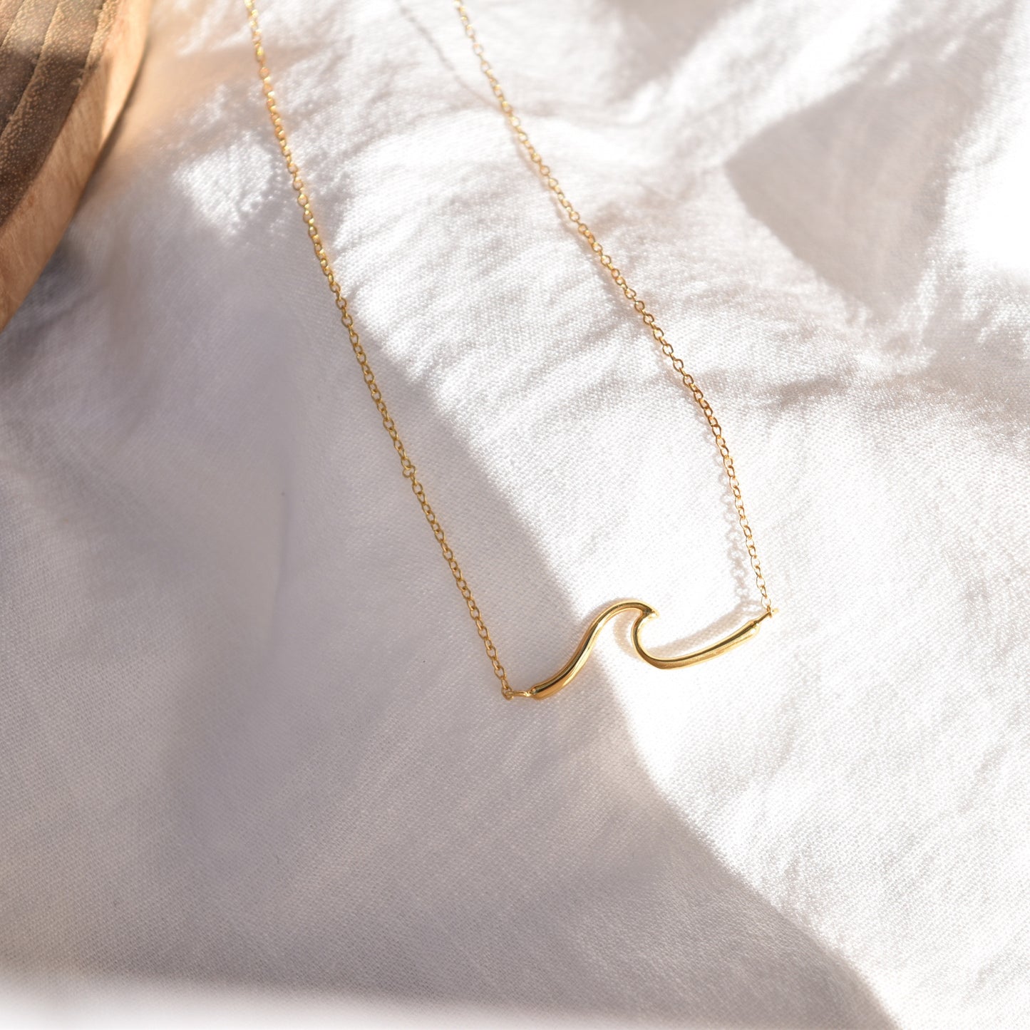 Gold wave necklace