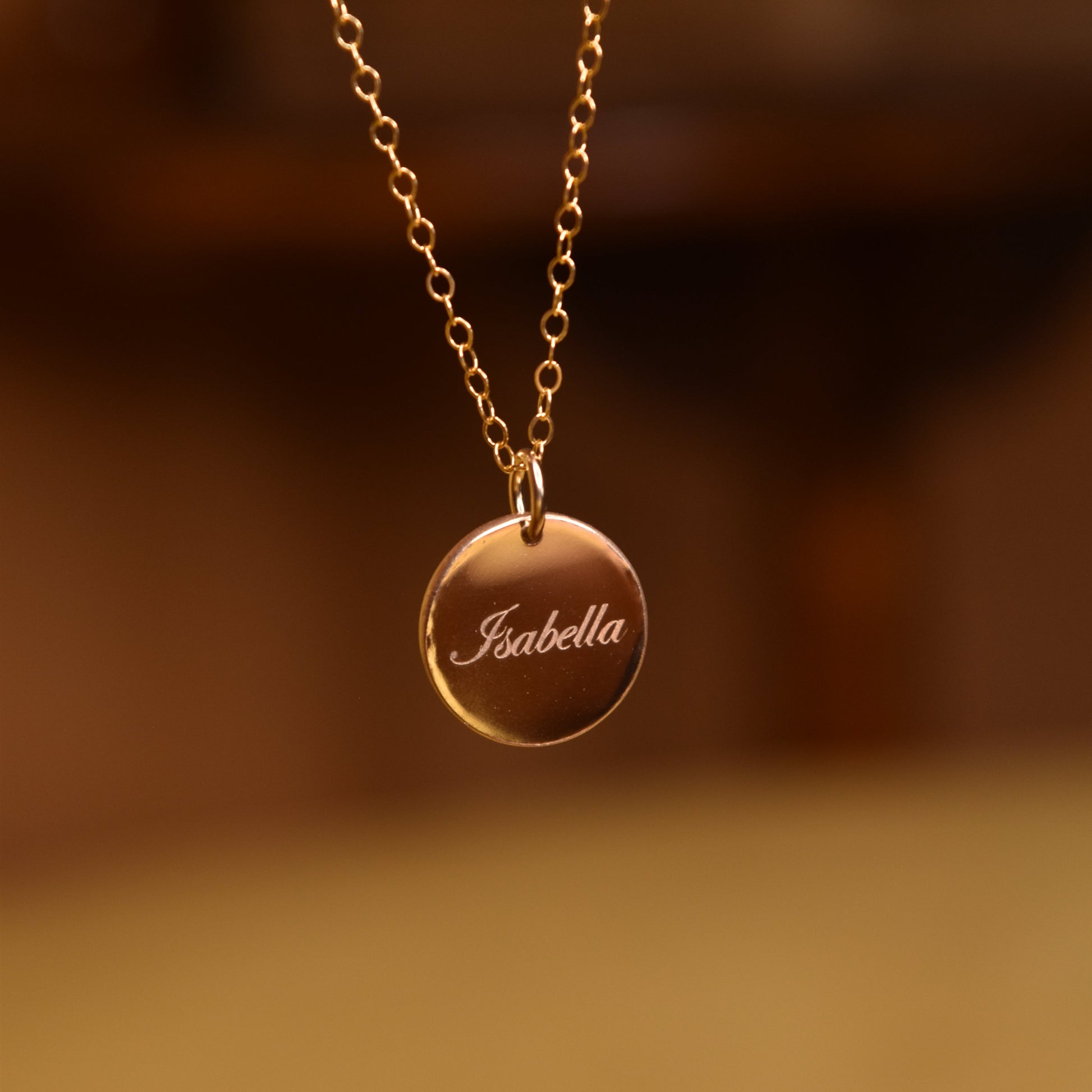 name engraved on a gold necklace- personalised engraving- april child