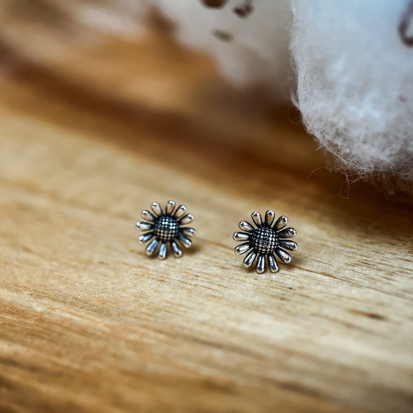 Ashy sunflower studs