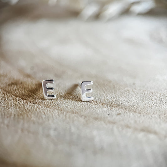 E initial studs