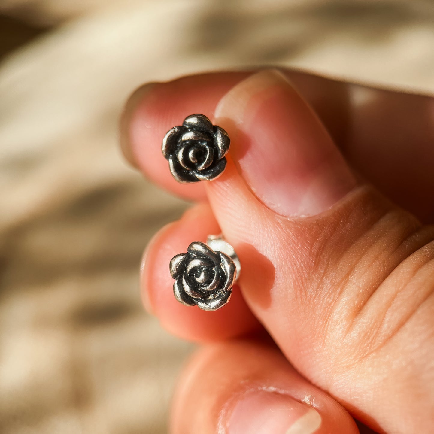 Black rose studs