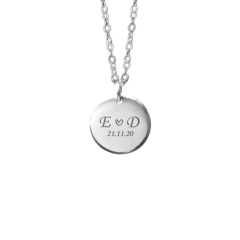 Silver necklace with a round pendant engraved with your name initials and a date. Keepsake jewellery. April Child