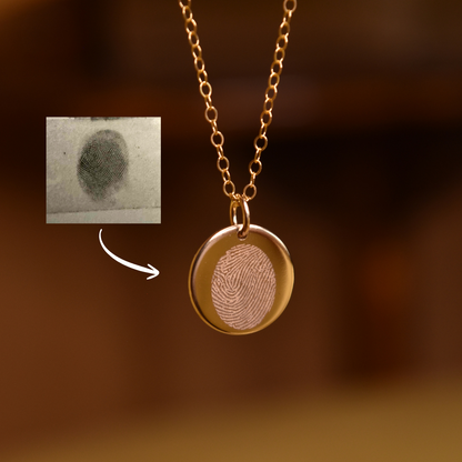 Round fingerprint necklace made in gold-filled materials. Personalised engraved jewellery Australia